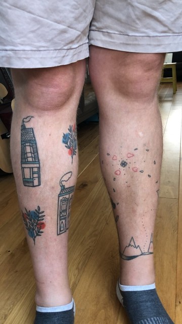 Photo of my legs with tattoos