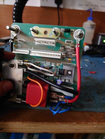The front of the repaired control box PCB, with the replaced diodes and resistor.