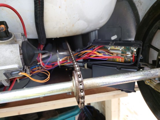 A picture of inside the back of the Sinclair C5, showing the control box installed without the top cover on with all the wires fully connected.