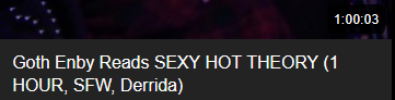 A very small screen grab from a generic popular porn site. The title reads "Goth Enby Reads SEXY HOT THEORY (1 HOUR, SFW, Derrida). Some glowing purple lights are visible in the lower left hand corner, & the time stamp is visible in the lower right hand corner.