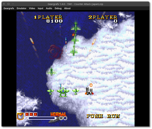 🕶️ A view of its UI (version 1.4.0, dark theme, under Linux) with the game “1941 Counter Attack”, an arcade classic, a shooter in which the player pilots a plane and battles tons of other planes during WW2. The screenshot does not reflect the quality of the realization, as the image is taken in motion, with the inherent blur. The emulator menus are displayed at the top, while the rest of the screen is devoted to the game in progress.

📚️ Geargrafx is a libre, multi-platform NEC TurboGrafx-16 (PC Engine) & Supergrafx consoles emulator. It has an interface or can be run from the command line, and features HLE BIOS support (no need for an external BIOS), drag-and-drop content, compressed content, state saving, modern controllers, automatic game/sound interruption on loss of focus. It also offers a full debugger (with just-in-time disassembler, CPU breakpoints, memory access breakpoints, code navigation, debugging symbols, automatic labels, memory editor, PSG inspector and video viewer including registers, tiles, sprites and backgrounds). A very good emulator.