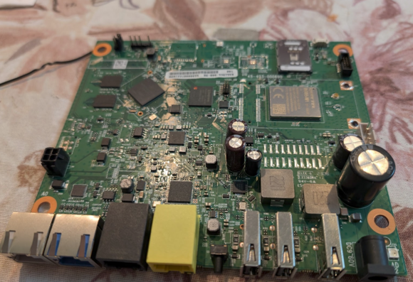 A circuit board harvested out of a SunPower monitor. There are 4(!) ethernet ports in the lower-left corner, and 3 USB-A ports toward the right side, plus numerous chips.