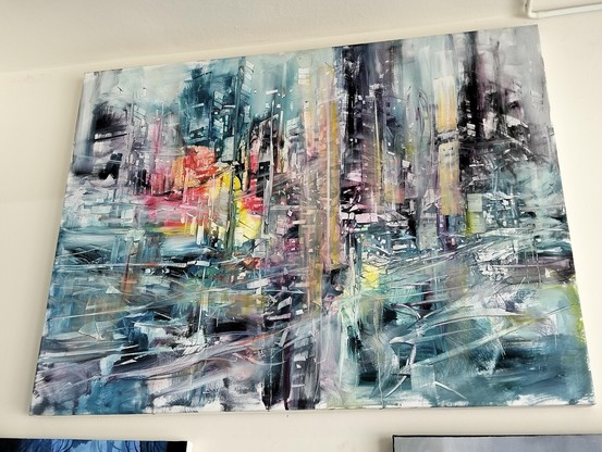 a   painting  of a city  scape,  crowded  buildings and energy rushing  through it, it is mostly tinted blue with some red and gold and purple and black and white