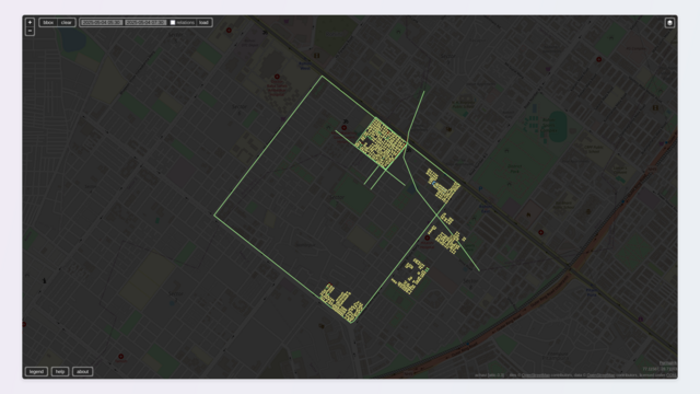 Screenshot of Achavi, showing the changes made in Rohini during the remote mapping party. The majority of changes was the addition of buildings, shown as dense clusters of yellow nodes and green polygons.