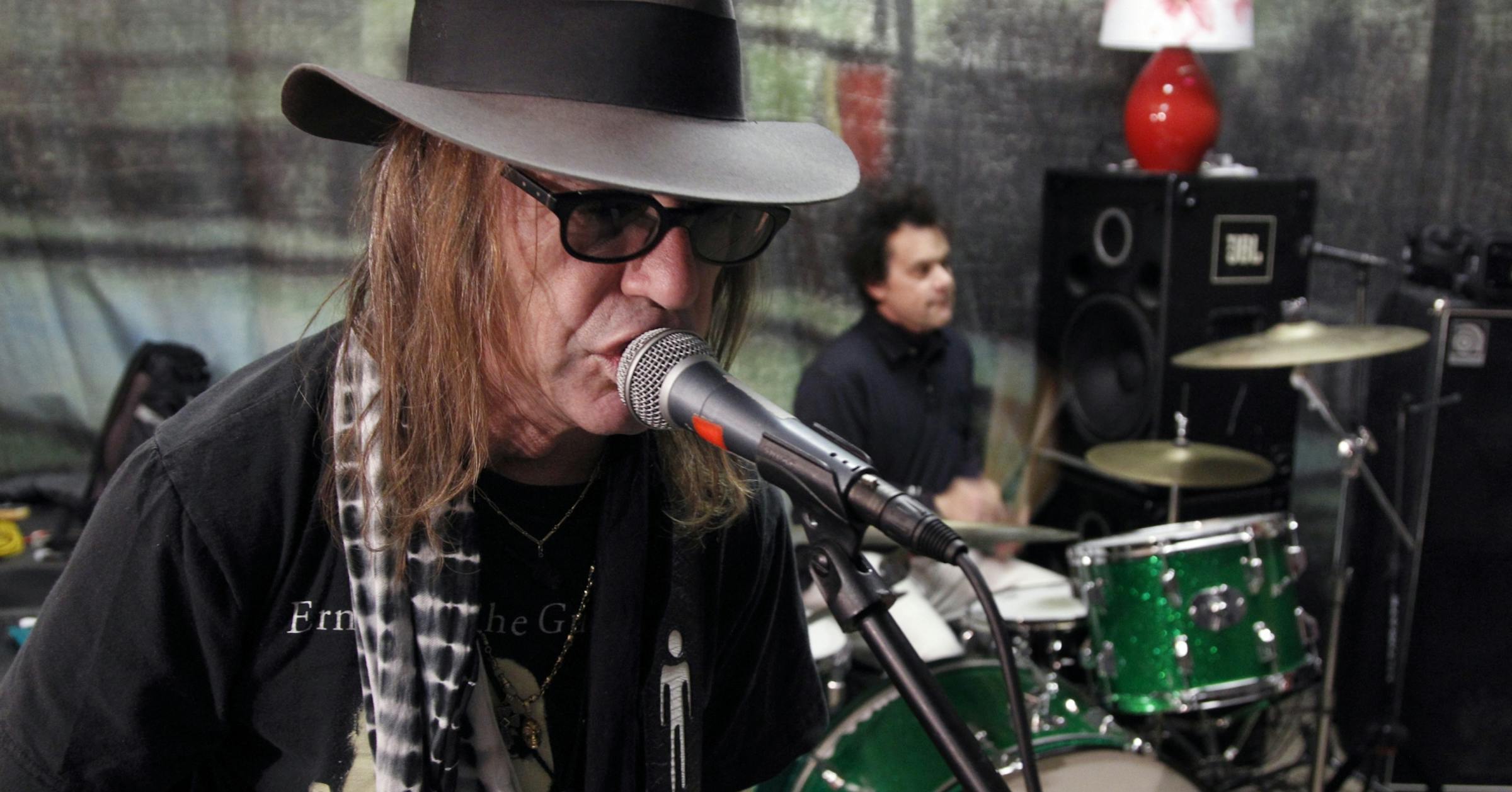 The Suburbs, John "Beej" Chaney, guitar vocals, during a rehearsal last week in North Minneapolis. He and the band were getting ready for another round of Suburbs reunions, and he's back in the studio recordings for the first time in years. [ TOM WALLACE • twallace@startribune.com_ Assignment_#20020565A_ November 11, 2011 _ SLUG: burbs1118_ EXTRA INFORMATION: Name CQ, Internet, John "Beej" Chaney, guitar vocals, keyboardist Chan Poling, Hugo Klaers, drums, bassist Michael Halliday, Steve Brantse