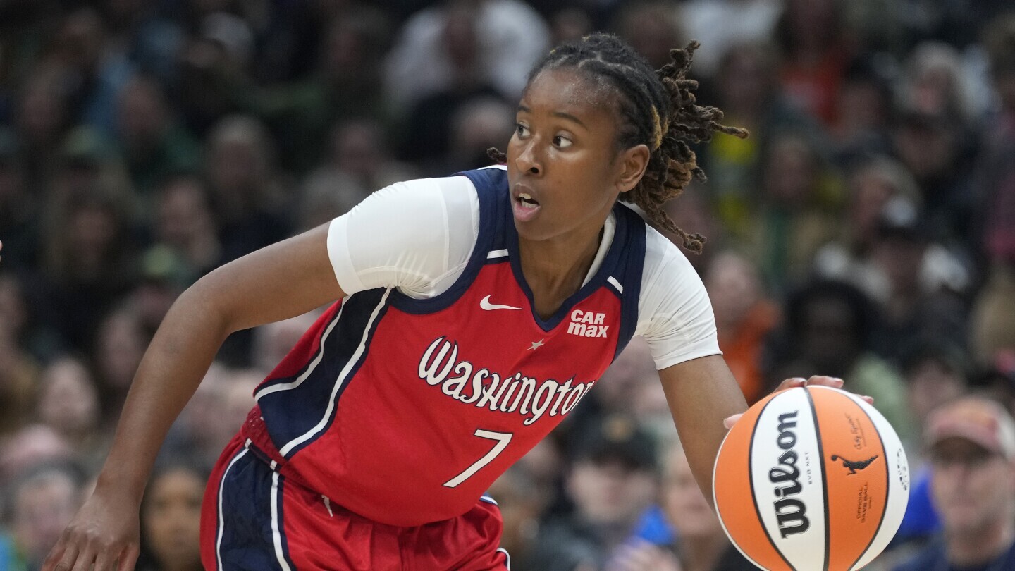 Washington Mystics guard Ariel Atkins (7) moves the ball against the Seattle Storm during a WNBA basketball game May 25, 2024, in Seattle. (AP Photo/Lindsey Wasson, File) Washington Mystics guard Ariel Atkins (7) moves the ball against the Seattle Storm during a WNBA basketball game May 25, 2024, in Seattle. (AP Photo/Lindsey Wasson, File)