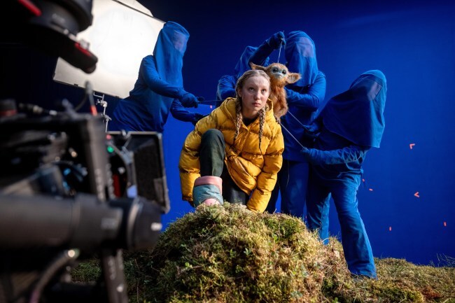 THE LEGEND OF OCHI, Helena Zengel, with Ochi, on set, 2025. © A24 /Courtesy Everett Collection