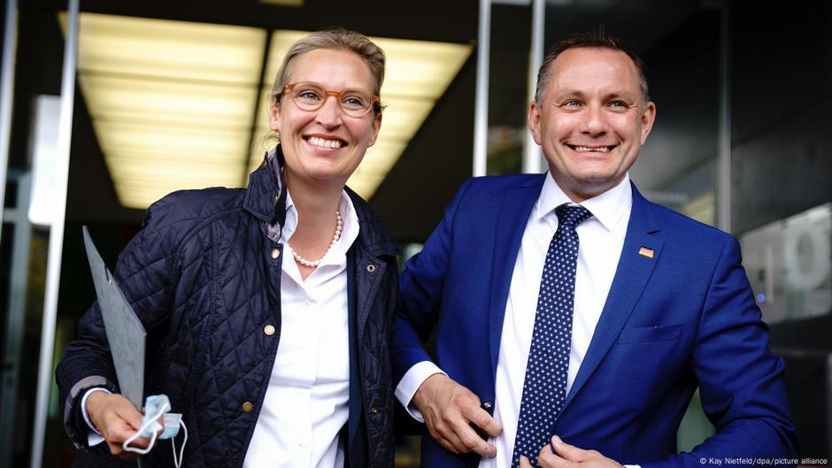 Smiling for the cameras: AfD's Alice Weidel and Tino Chrupalla walk towards a press conference looking upbeat. | Image: Kay Nietfeld/dpa/picture alliance Smiling for the cameras: AfD's Alice Weidel and Tino Chrupalla walk towards a press conference looking upbeat. | Image: Kay Nietfeld/dpa/picture alliance