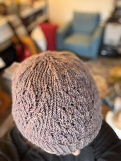 Person wearing hat- mostly hat visible.