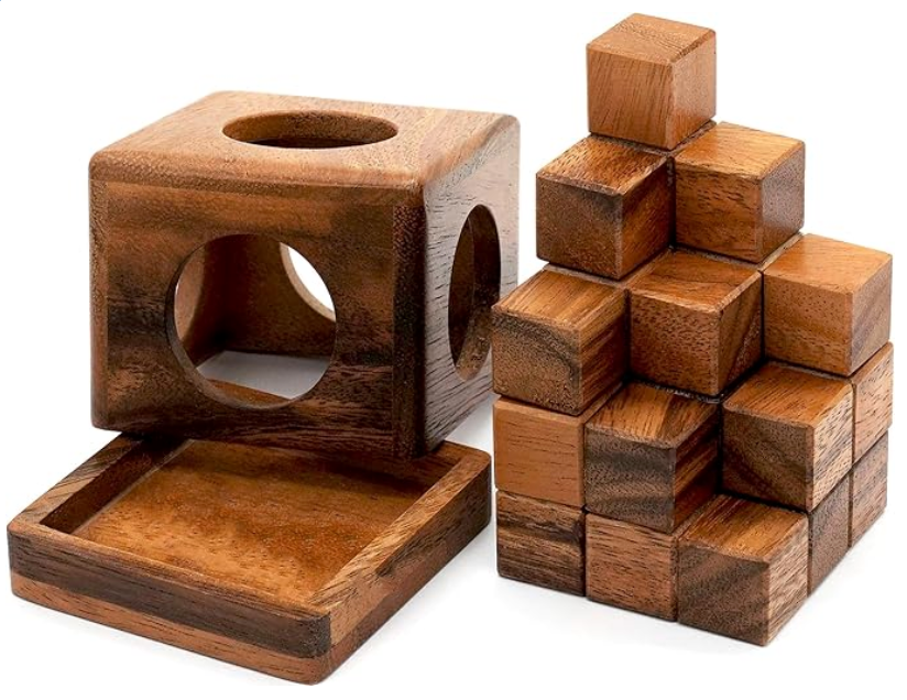Soma cube made of seven 3D pieces, with hardwood case.