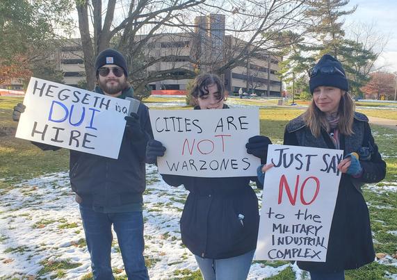 protesting war crimes, corruption, and military in cities, on the PFW campus