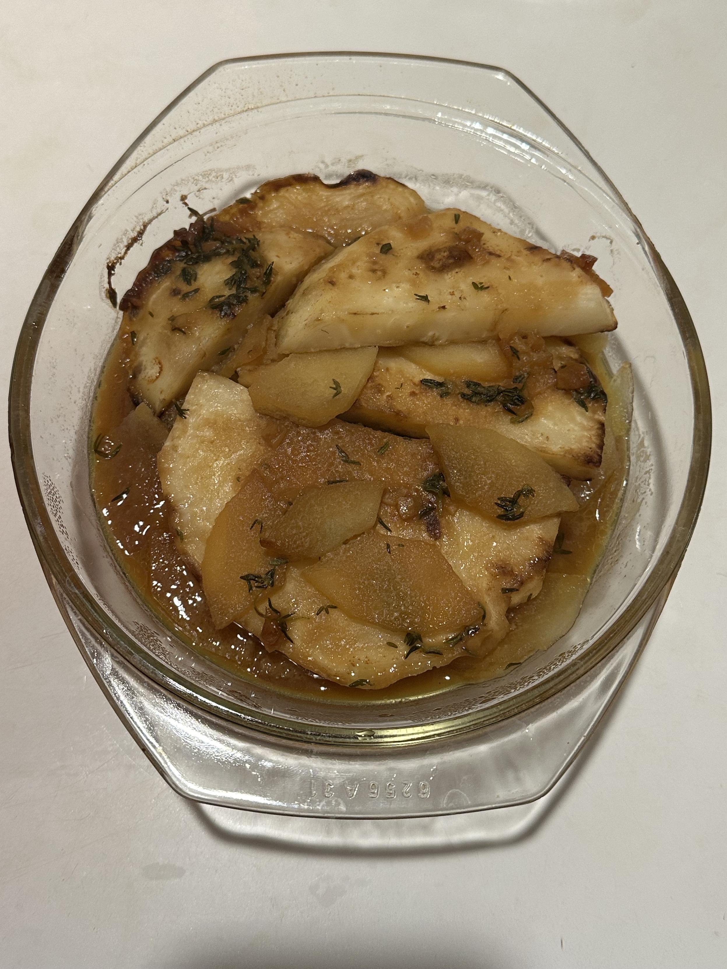 Celeriac slices and apple after cooking in the oven with miso-honey-thyme-butter glaze.