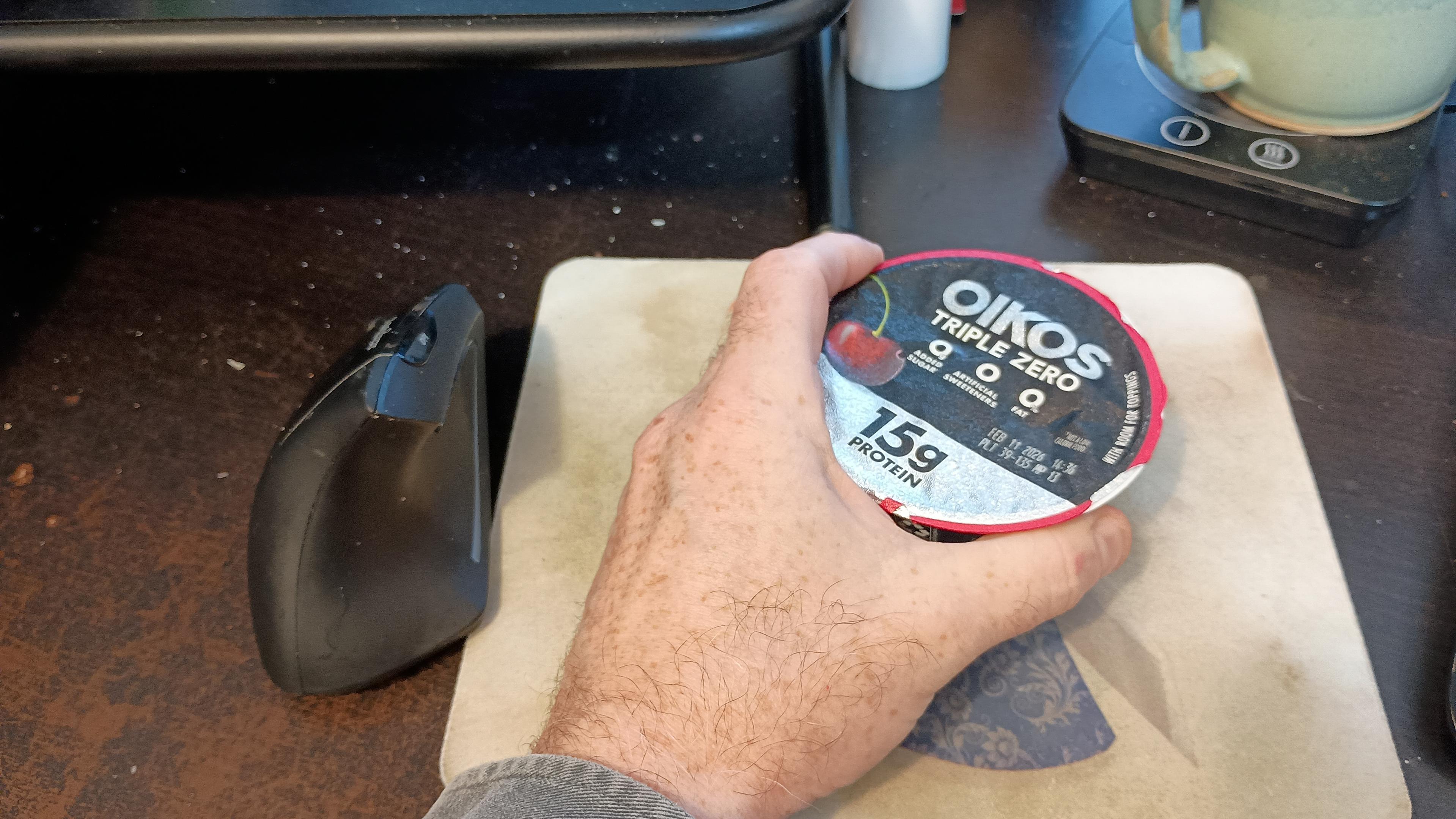 The real mouse is neglected, off to the left. My hand is actually on an unopened single-serving cup of cherry yogurt.