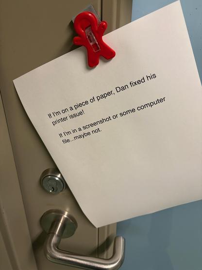 A note attached to an office door. It says "if I'm on a piece of paper, Dan fixed his computer issue! If I'm in a screenshot or some computer file...maybe not."